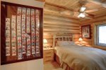 Deer Haven Lodge bedroom with a Queen log bed. 
